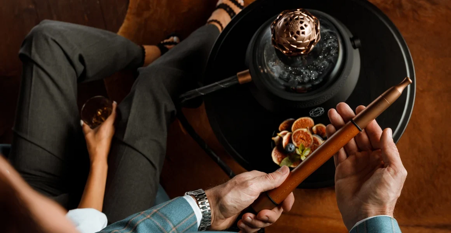 Kaloud hookah experience featuring a handcrafted hookah setup and heat management accessories