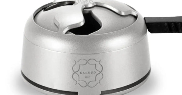 Kaloud Lotus I+ stainless steel heat management device shown in profile with vented lid and tong handle