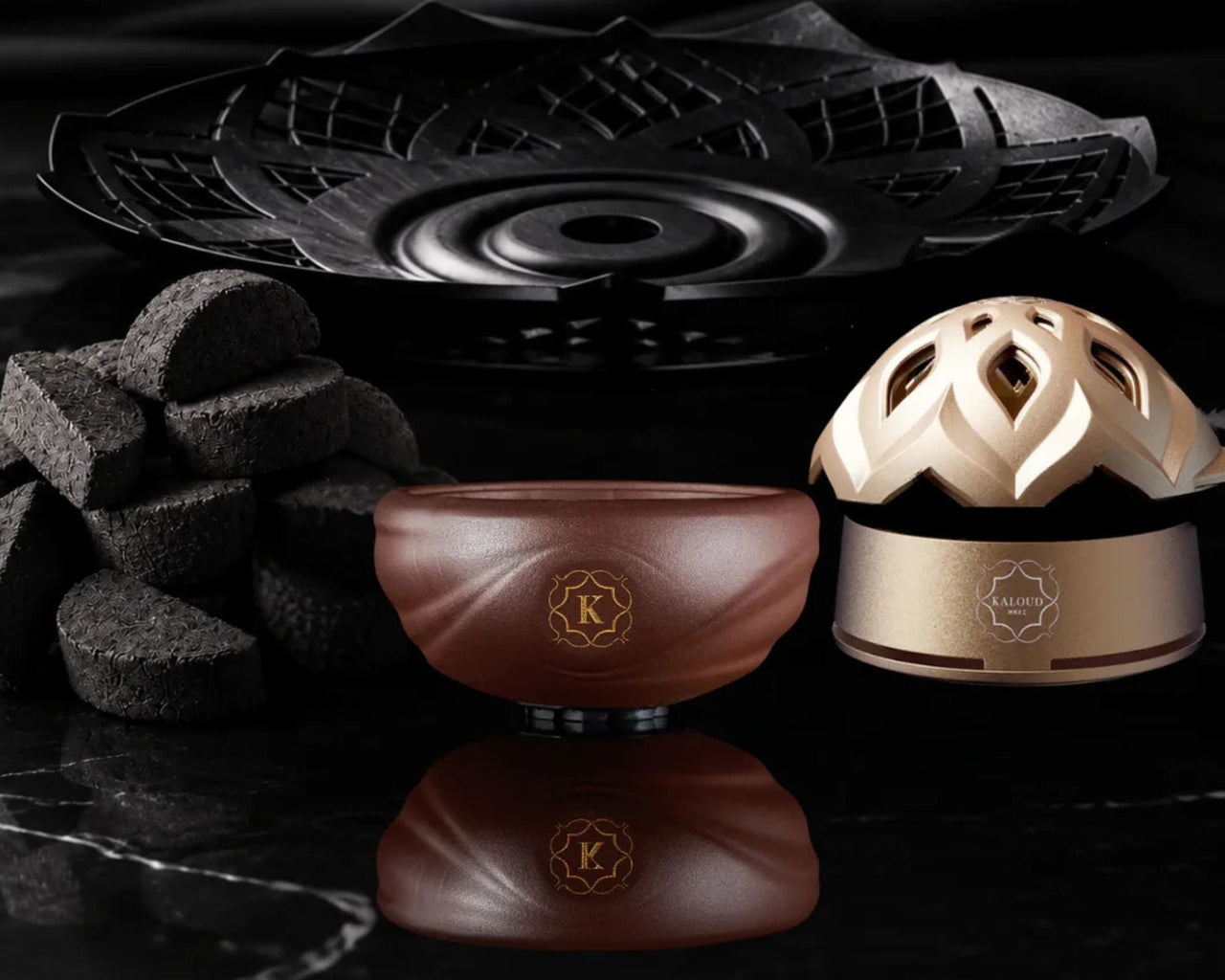 Kaloud hookah heat management setup featuring a Lotus HMD, Samsaris bowl, charcoal cubes, and premium accessories