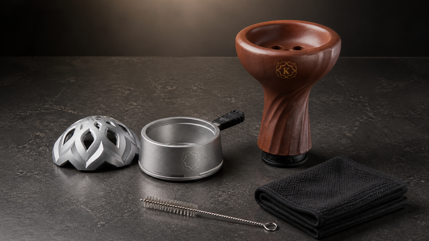 Kaloud Lotus 3 heat management device separated for cleaning beside a Kaloud clay bowl, black microfiber cloth, and small cleaning brush