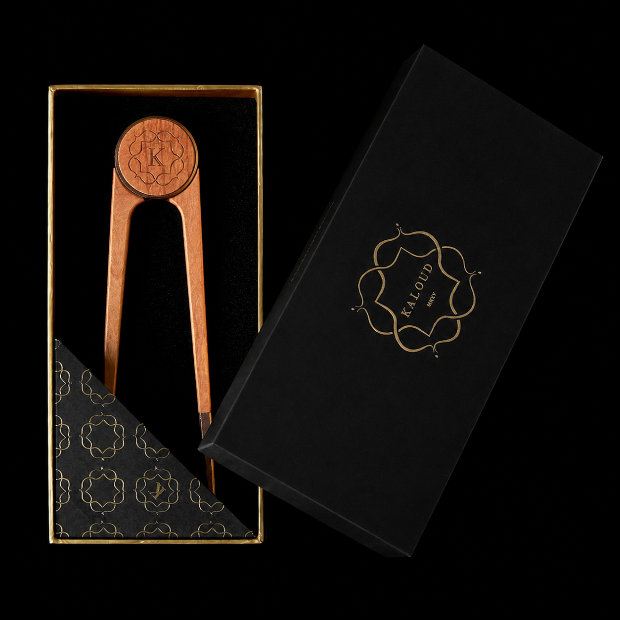 Kaloud Vestara Cyris hookah charcoal tongs in black-and-gold presentation packaging